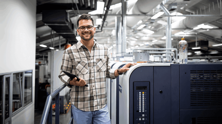 Print Shop Owner who is happy about Payment Automation