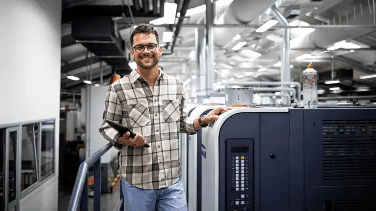 Print Shop Owner who is happy about Payment Automation
