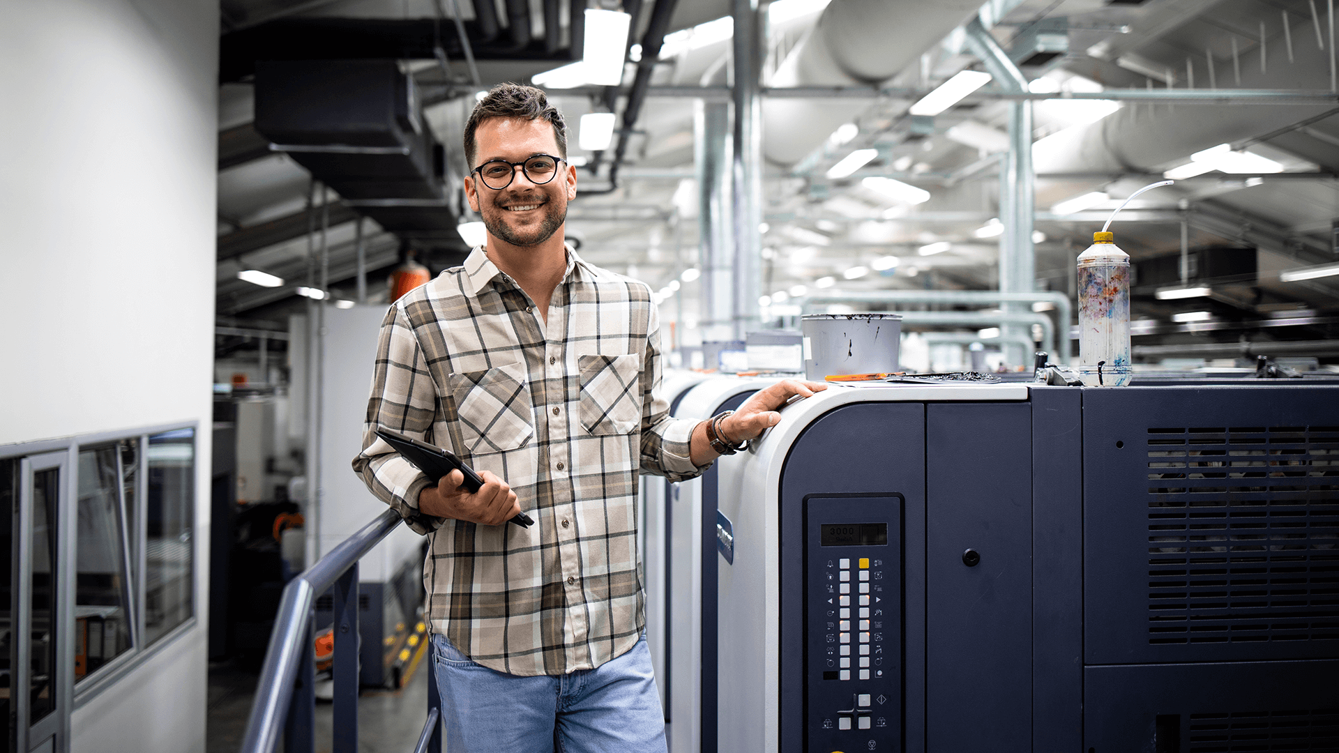 Print Shop Owner who is happy about Payment Automation