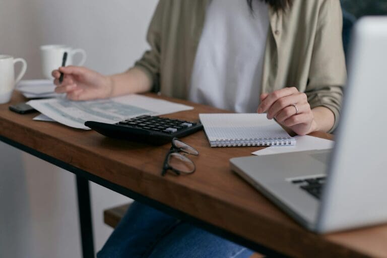 A person doing manual invoicing